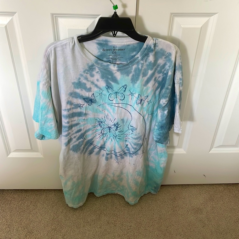 This graphic tee is one size fits all, and it has an oversized fit.